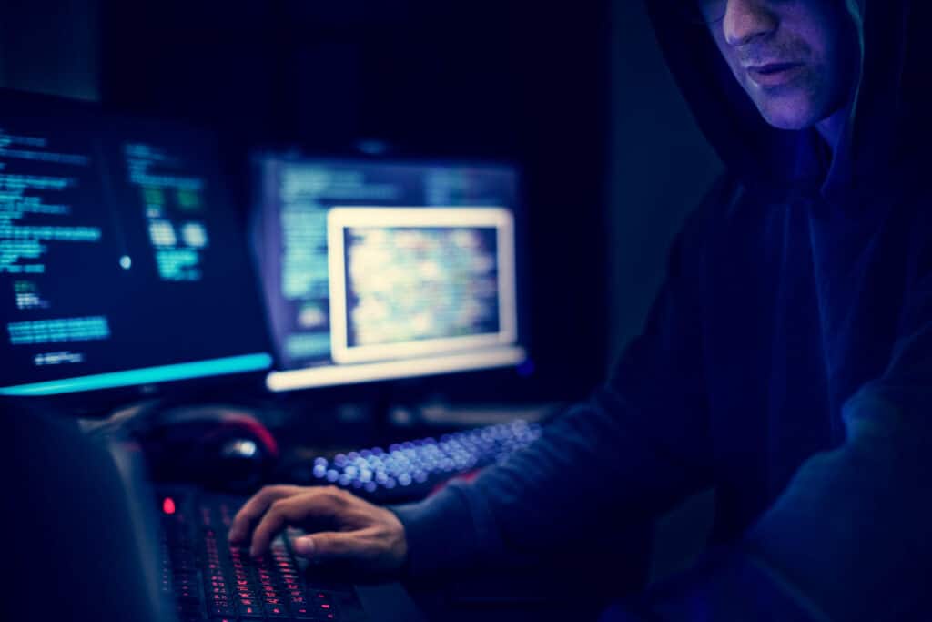 Hacker in dark room