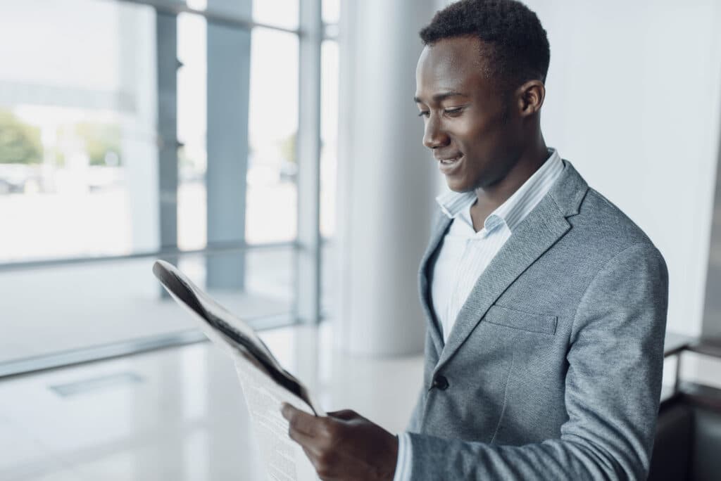 man reading a newspaper