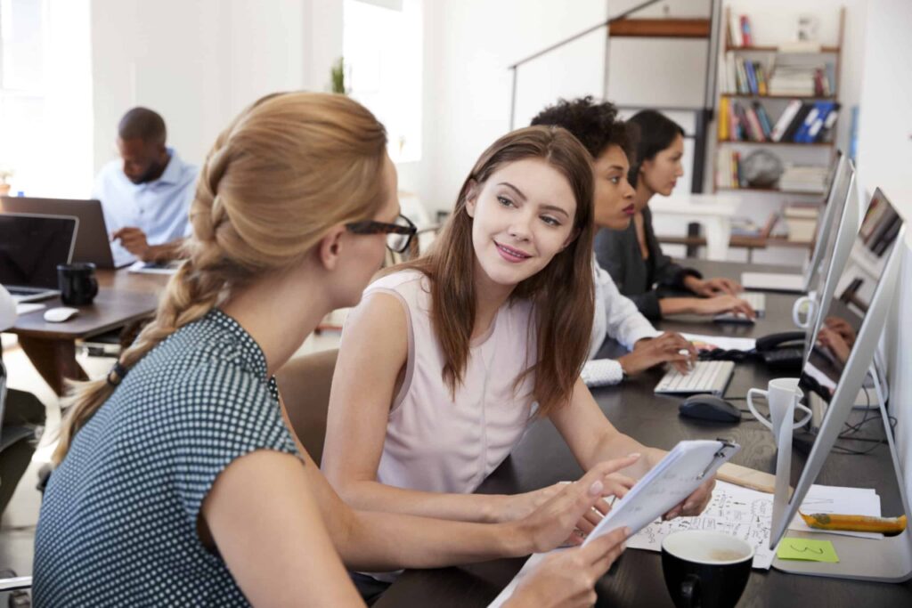 female employees working on cybersecurity awareness training